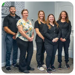 Chiropractor Albion MI Jacob Tazzi With Team